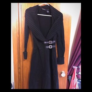 Detailed buckle sweater dress.